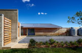 11_CURB_Summer_North-Face_Entry
